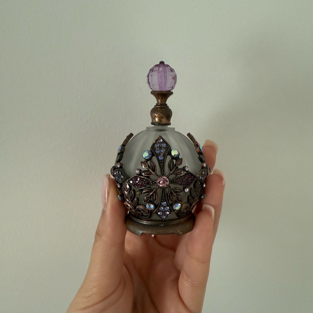 Elegant Purple and Bronze Perfume Bottle